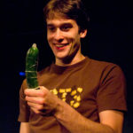 Man with zucchini and condom as seen in "The Gene Pool" at Annex Theatre, Capitol Hill, Seattle